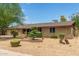 Ranch style home with landscaped yard and two-car garage at 3136 W Sunnyside Ave, Phoenix, AZ 85029