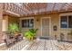 Front entry with pergola, security door, and seating area at 3136 W Sunnyside Ave, Phoenix, AZ 85029