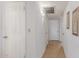 Clean hallway with tile flooring and neutral-colored walls at 3136 W Sunnyside Ave, Phoenix, AZ 85029