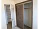 Bedroom closet with sliding doors and shelving at 33767 W Grande Rd, Stanfield, AZ 85172