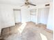 Bedroom with ceiling fan and double closets at 33767 W Grande Rd, Stanfield, AZ 85172