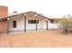 Ranch style home with covered patio and spacious backyard at 33767 W Grande Rd, Stanfield, AZ 85172