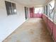 Long covered patio, pink door, needs TLC at 33767 W Grande Rd, Stanfield, AZ 85172