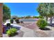 Landscaped front yard with walkway and desert plants at 3818 N Kalispell Ct, Casa Grande, AZ 85122