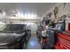 Organized garage with workbench, ample storage, and room for a vehicle at 3818 N Kalispell Ct, Casa Grande, AZ 85122