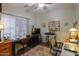 Home office with a desk, chair, and sewing machine at 3818 N Kalispell Ct, Casa Grande, AZ 85122