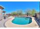 Stunning kidney-shaped pool with a spa, perfect for relaxation at 3818 N Kalispell Ct, Casa Grande, AZ 85122