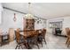 Dining room with wooden table and chairs at 4035 W Country Gables Dr, Phoenix, AZ 85053