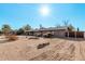 Ranch style home with desert landscaping at 4035 W Country Gables Dr, Phoenix, AZ 85053