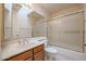 Bathroom with tub, shower, and wood vanity at 4116 E Sunnyside Dr, Phoenix, AZ 85028