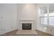 Living room fireplace with a clean and modern look at 4116 E Sunnyside Dr, Phoenix, AZ 85028