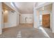 Bright and airy living room with high ceilings and a chandelier at 4116 E Sunnyside Dr, Phoenix, AZ 85028