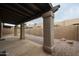 Covered patio with stone columns and gravel at 4116 E Sunnyside Dr, Phoenix, AZ 85028