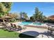 Community pool with lounge chairs and spa at 4116 E Sunnyside Dr, Phoenix, AZ 85028