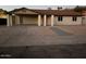 Ranch style home with carport, updated facade, and landscaped yard at 4220 W State Ave, Phoenix, AZ 85051