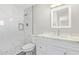 Bright bathroom with stand up shower, modern tiling, and a large mirror at 4220 W State Ave, Phoenix, AZ 85051