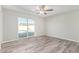 Bedroom with sliding glass doors that lead to backyard pool and patio area at 4220 W State Ave, Phoenix, AZ 85051