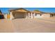 Single-story home featuring a covered carport and desert landscaping at 4220 W State Ave, Phoenix, AZ 85051