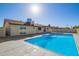 Exterior view of the in-ground pool and the home's patio at 4220 W State Ave, Phoenix, AZ 85051