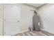 Interior view of utility area with water heater and storage space at 4220 W State Ave, Phoenix, AZ 85051