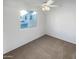 Spacious bedroom with neutral carpeting and ceiling fan at 441 S Maple -- # 123, Mesa, AZ 85206