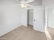 Bright bedroom with ceiling fan and double door closet at 441 S Maple -- # 123, Mesa, AZ 85206