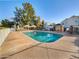 Community pool with lounge chairs and shade structures at 441 S Maple -- # 123, Mesa, AZ 85206