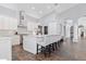 Modern kitchen with white cabinetry, a large island, and stainless steel appliances at 4575 E Encinas Ave, Gilbert, AZ 85234