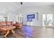 Living room with a large sectional sofa and built-in aquarium at 4575 E Encinas Ave, Gilbert, AZ 85234