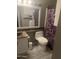 A bathroom featuring a white vanity, framed mirror, tile floors, and a patterned shower curtain at 4730 W Northern Ave # 1076, Glendale, AZ 85301