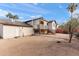 View of home's exterior and spacious backyard at 4947 E Adobe St, Mesa, AZ 85205