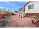 Large backyard with patio and partial view of home at 4947 E Adobe St, Mesa, AZ 85205