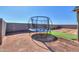 Backyard with trampoline and artificial turf at 5175 W Warren Dr, Casa Grande, AZ 85194