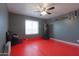 Bedroom with MMA equipment and red mat flooring at 5175 W Warren Dr, Casa Grande, AZ 85194