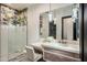 Stylish bathroom with a walk-in shower and floral wallpaper at 5712 E Calle Camelia --, Phoenix, AZ 85018