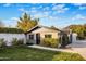 Exterior view of charming guest house with brick accents at 5712 E Calle Camelia --, Phoenix, AZ 85018