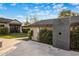 Private outdoor shower with stone tile and lush greenery at 5712 E Calle Camelia --, Phoenix, AZ 85018