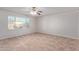 Bright bedroom with tile flooring and ceiling fan at 5804 E Dallas St, Mesa, AZ 85205