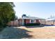 Brick ranch home with carport and wood fence at 621 W Howe St, Tempe, AZ 85281