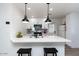 Modern kitchen island with white quartz countertops at 621 W Howe St, Tempe, AZ 85281