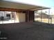 Backyard with covered patio and storage shed at 676 N 7Th Pl, Coolidge, AZ 85128