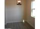 Bright dining area with light walls and wood-look flooring at 676 N 7Th Pl, Coolidge, AZ 85128