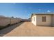 Spacious backyard with a view of the back of the house at 6815 W Reade Ave, Glendale, AZ 85303