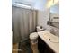 Practical bathroom with a vanity, toilet, and shower, ready for relaxation at 6815 W Reade Ave, Glendale, AZ 85303