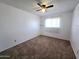 Inviting bedroom with a window, carpet, and walls, providing a serene retreat at 6815 W Reade Ave, Glendale, AZ 85303