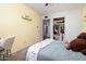 Bedroom featuring a large closet and built-in shelving at 6815 W Reade Ave, Glendale, AZ 85303