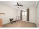 Cozy bedroom with carpeted floor and built-in desk at 6815 W Reade Ave, Glendale, AZ 85303