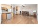 Dining area with wood floors and a table with chairs at 6815 W Reade Ave, Glendale, AZ 85303