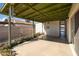 Spacious covered patio with string lights at 6815 W Reade Ave, Glendale, AZ 85303