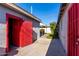 Backyard with access to storage and covered patio area at 7004 N 11Th Way, Phoenix, AZ 85020